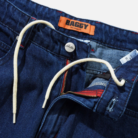 BUTTER GOODS Drummer Baggy Denim Jeans - Raw Dark Indigo