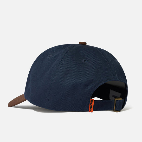 BUTTER GOODS Snail 6 Panel Cap - Navy/Walnut