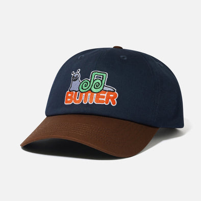 BUTTER GOODS Snail 6 Panel Cap - Navy/Walnut